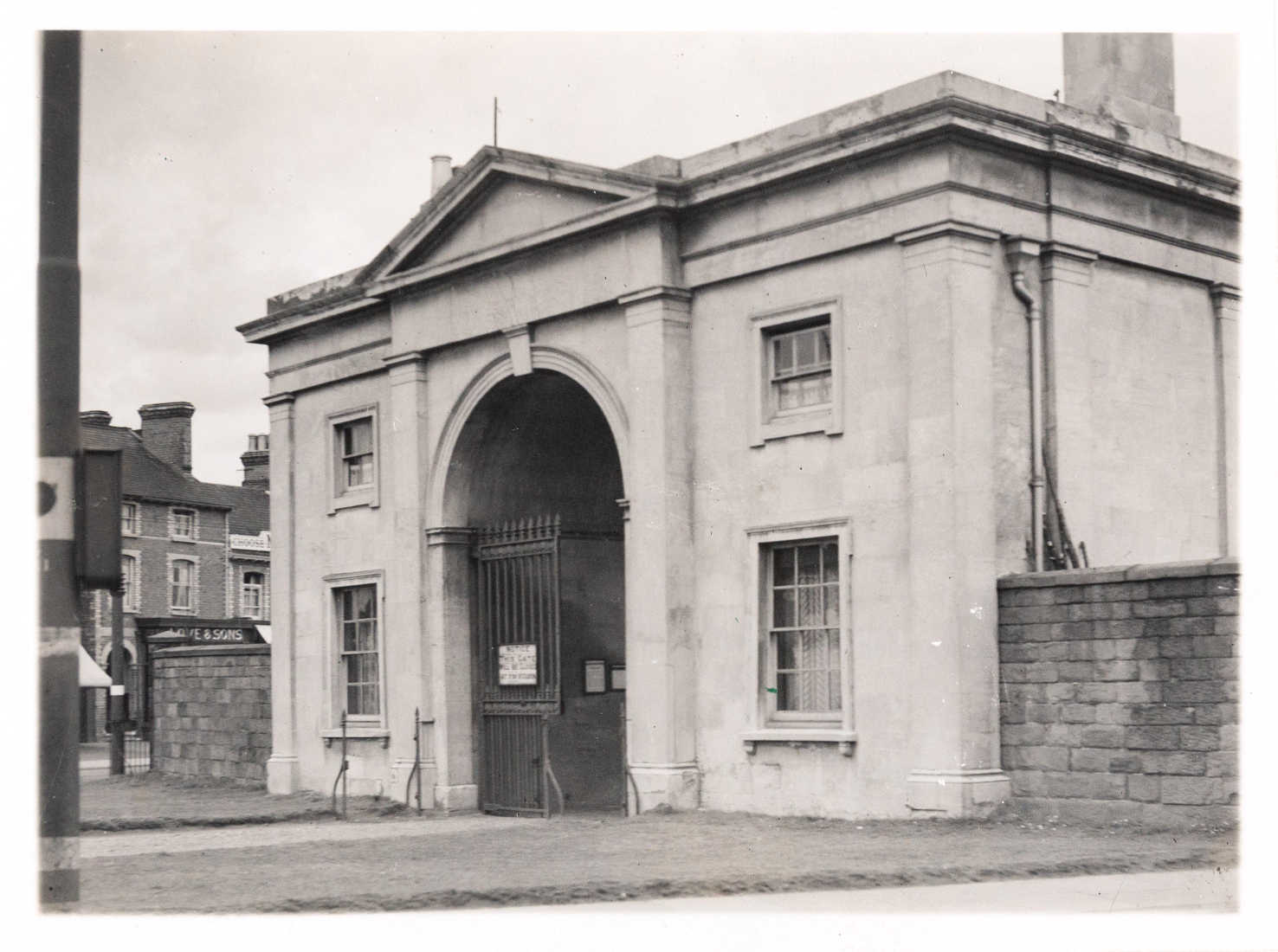 Greyscale photograph of gateway entrance.