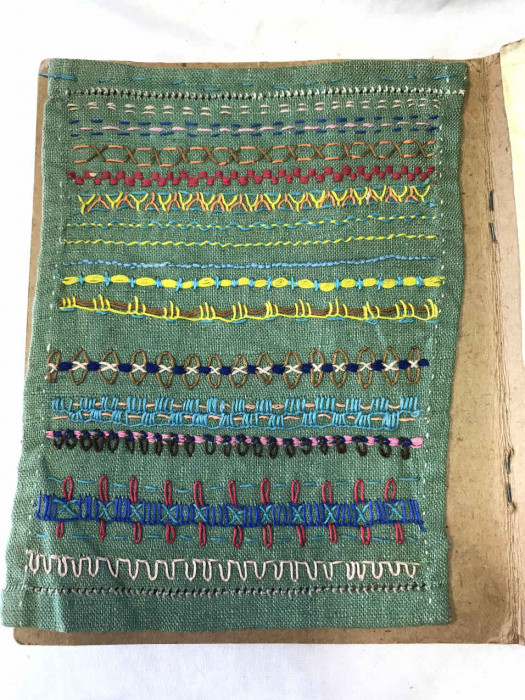 Cloth with rows of sample sewing stiches