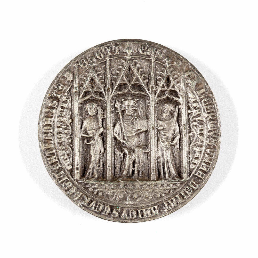 Round replica seal showing figure of King Henry I and two other persons